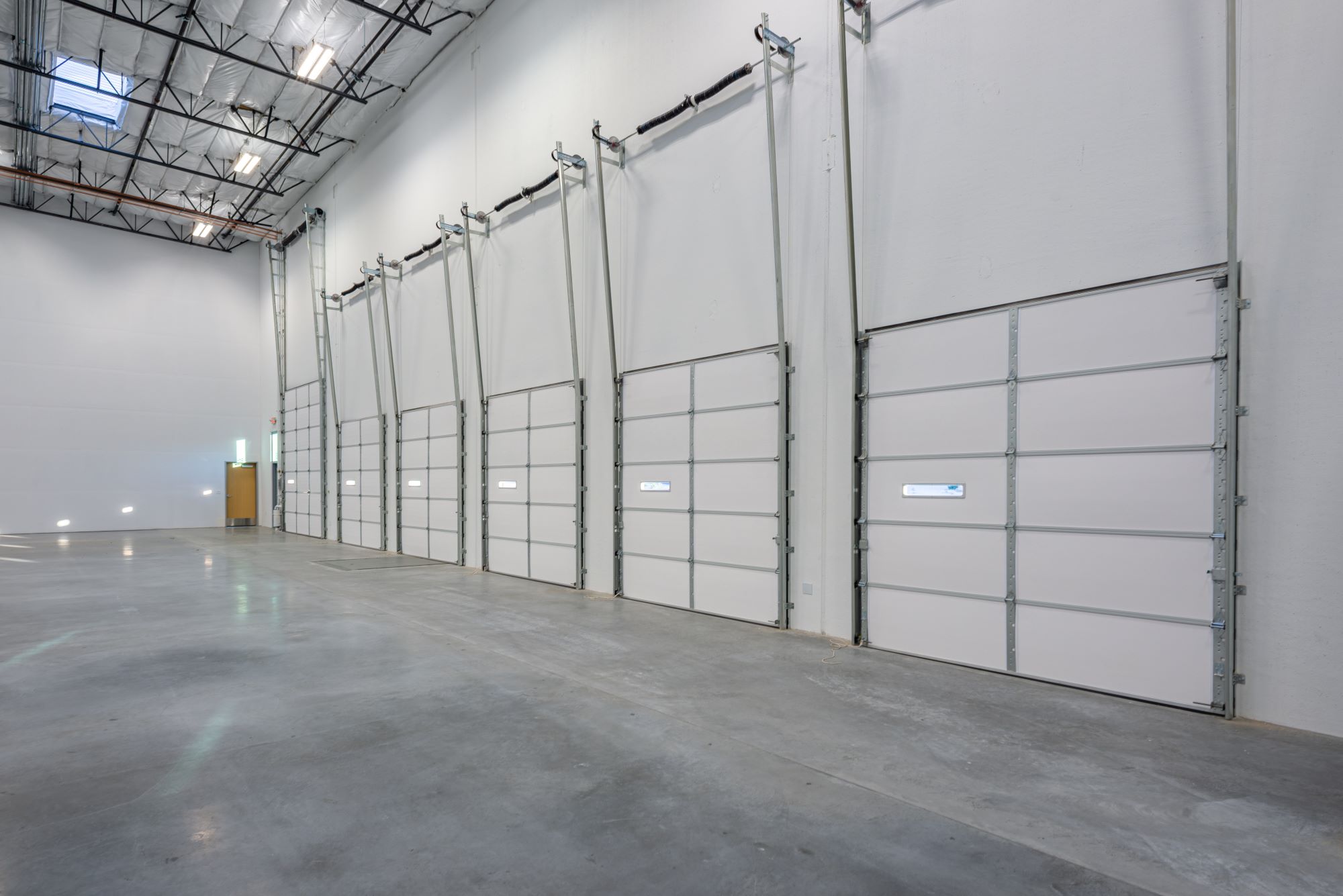 Tropical Speedway Commerce Center dock doors with tall ceiling heights